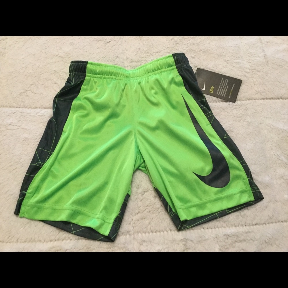 Boys green strike Nike shorts